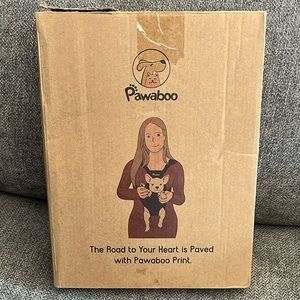 New in box adjustable front pet carrier.